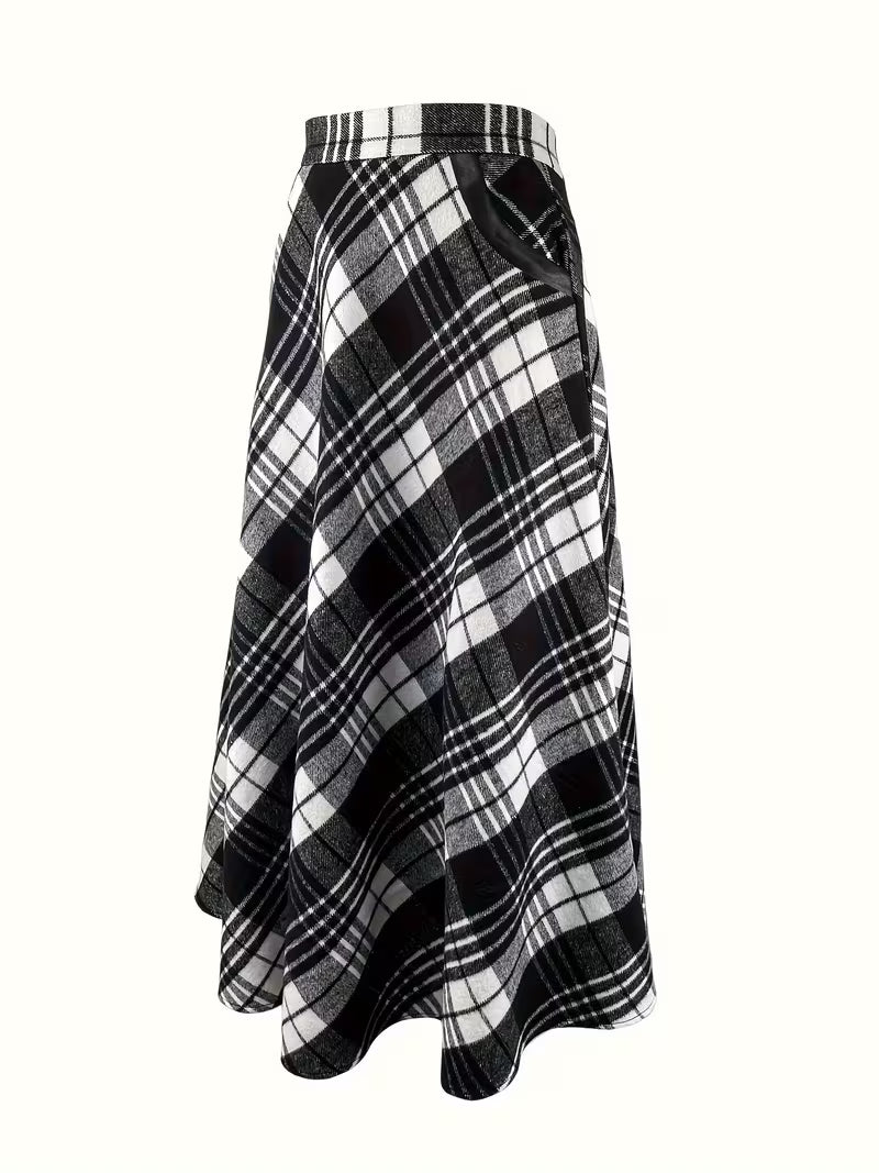 Plaid skirt with a black and white pattern on a white background