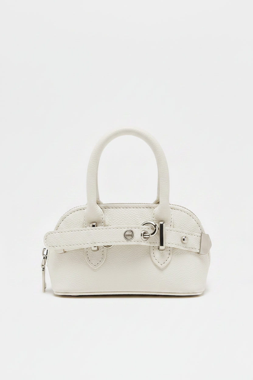 white handbag with a strap on a white background