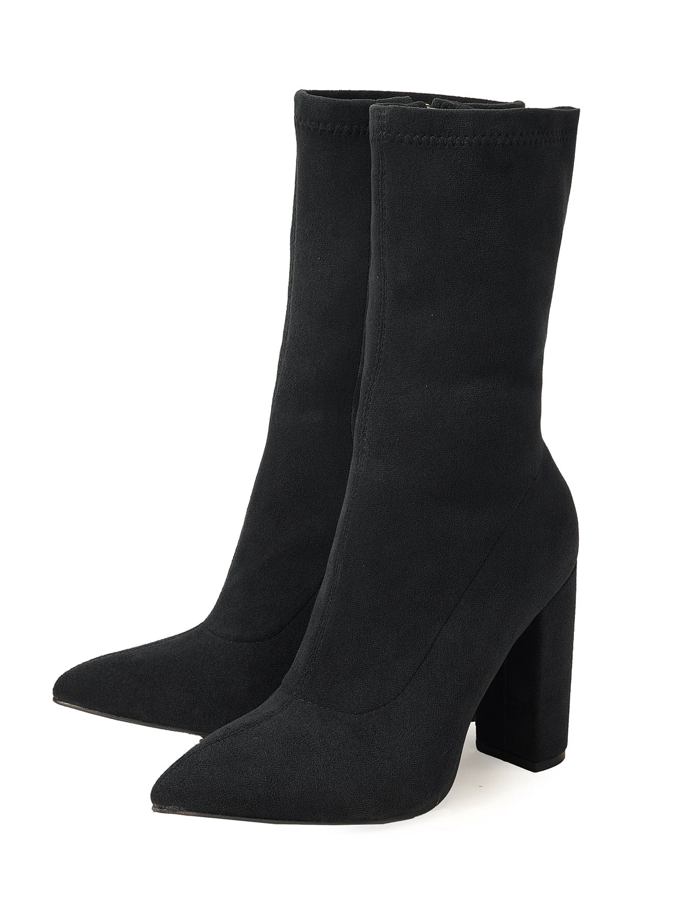 Black knee-high boots with a block heel on a white background