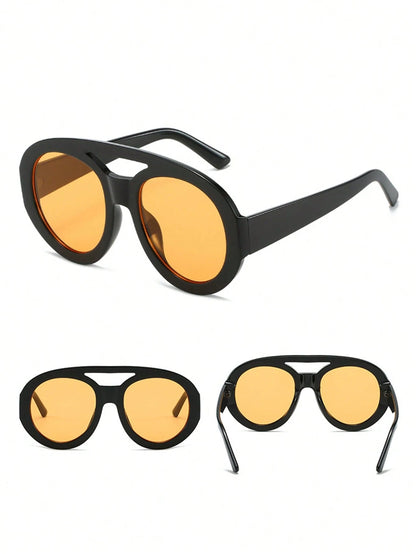 Black-framed sunglasses with yellow lenses on a white background