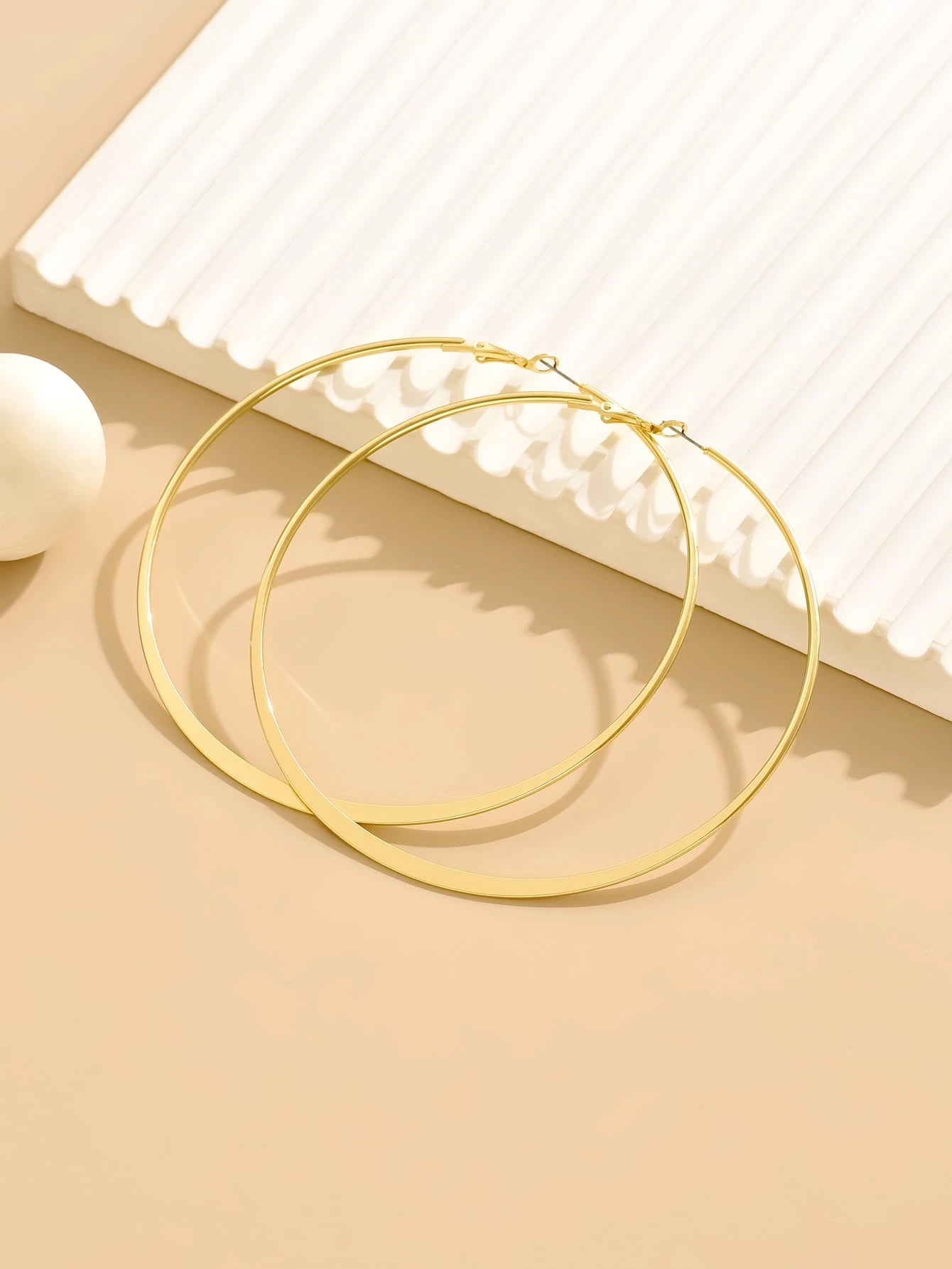 Faven gold hoop earring