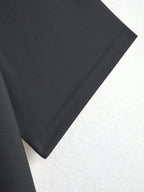 Close-up of black fabric on a white background