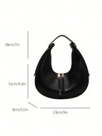 Black handbag with measurements on a white background