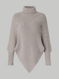 Beige ribbed sweater on a light gray background