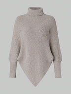 Beige ribbed sweater on a light gray background