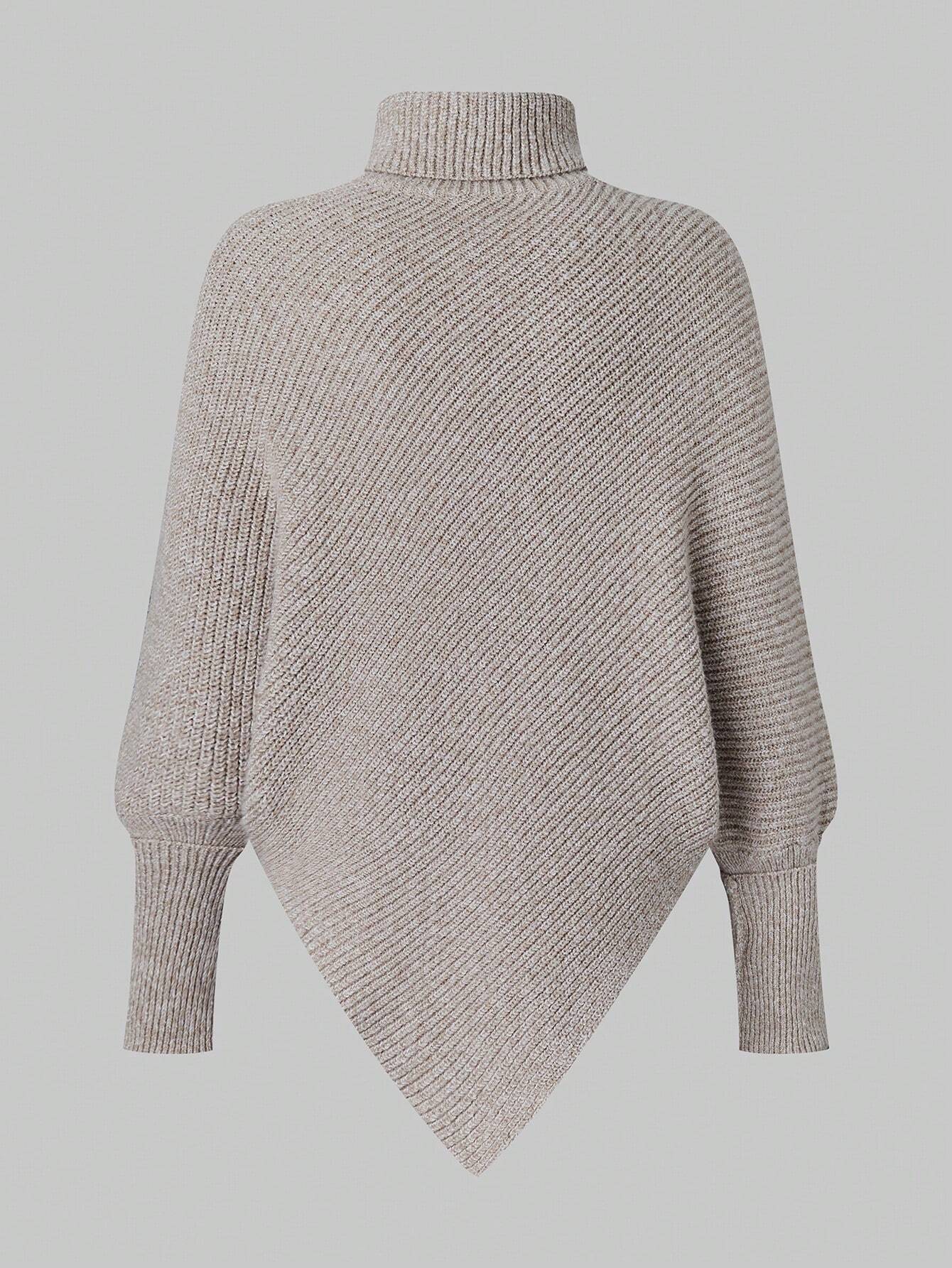 Knitted poncho on a light gray background