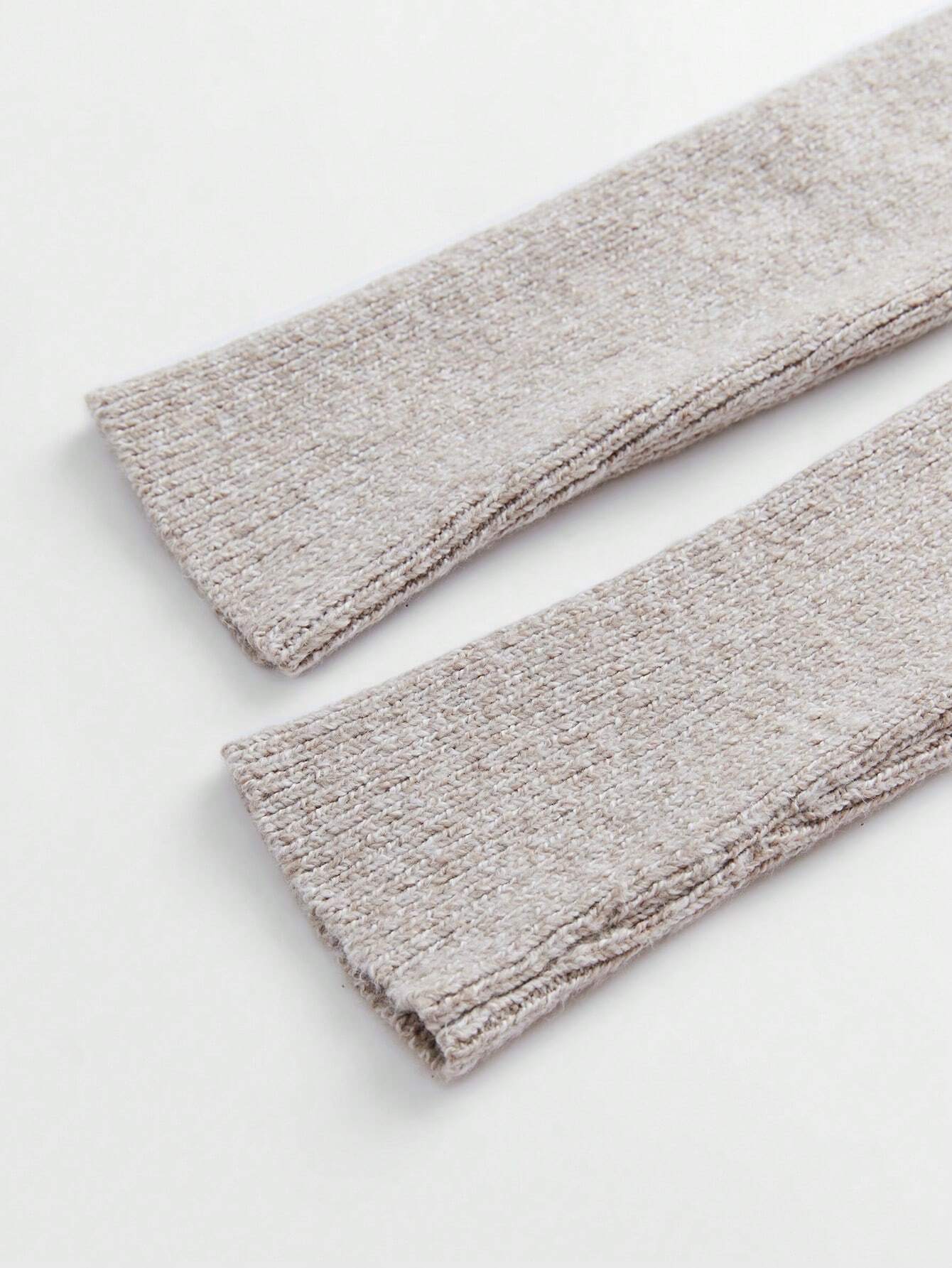 Two beige fabric swatches on a white background