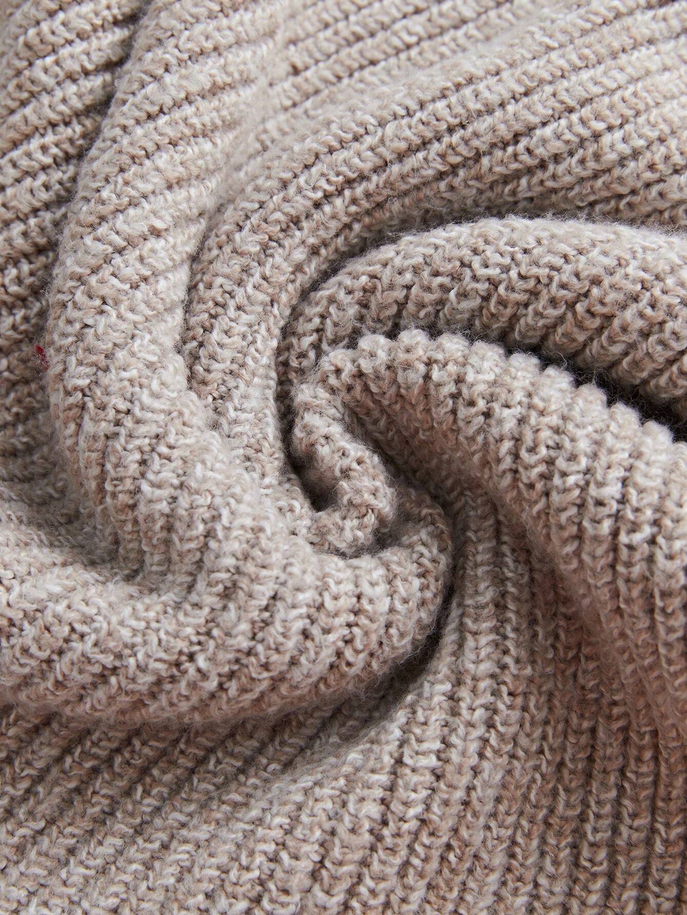 Close-up of beige textured fabric
