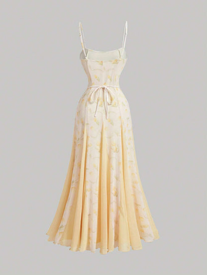 Yellow floral dress on a gray background