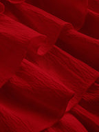 Close-up of red fabric with ruffled texture