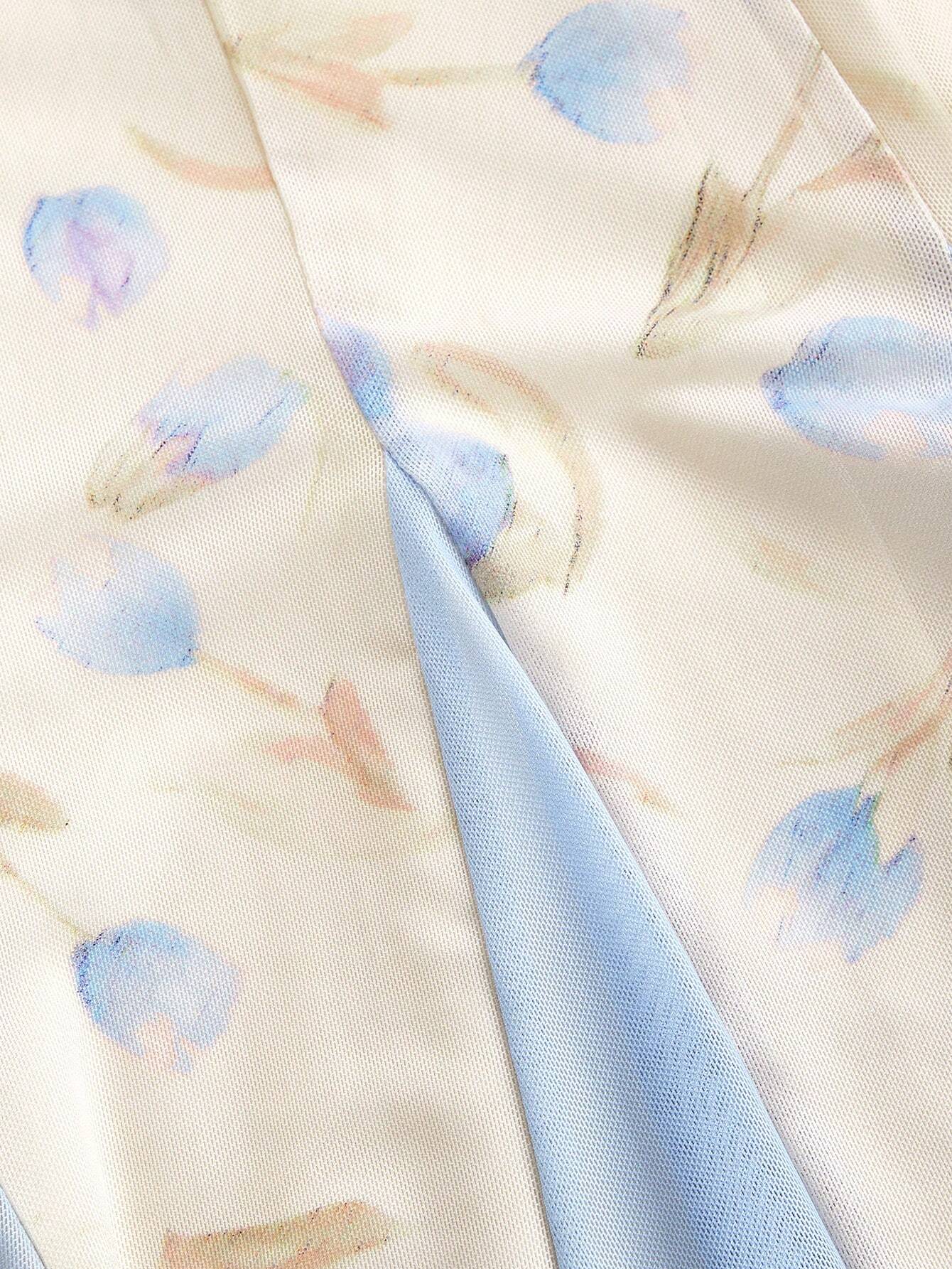 Close-up of fabric with blue floral pattern on a beige background