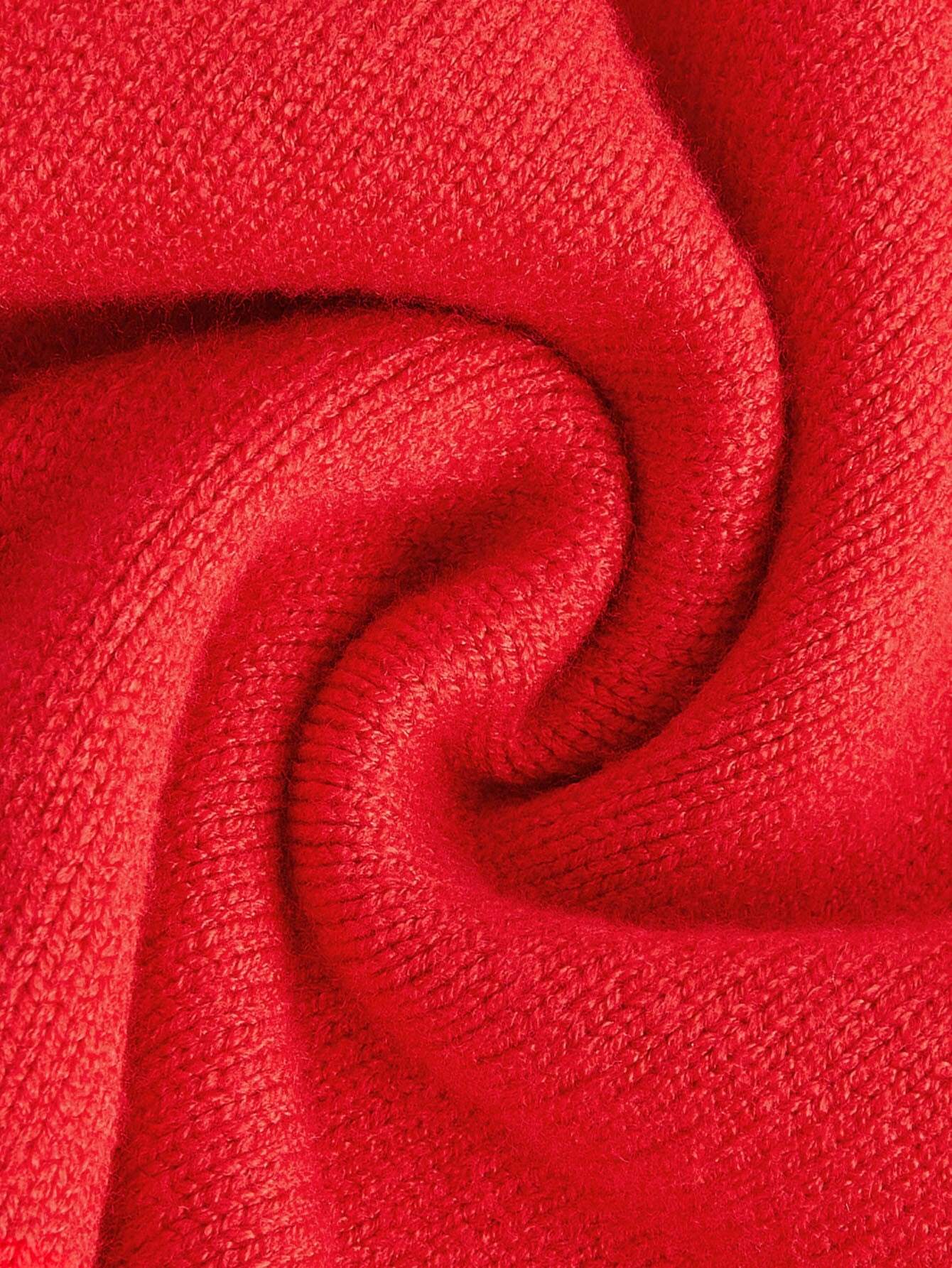 Close-up of red fabric with a textured pattern