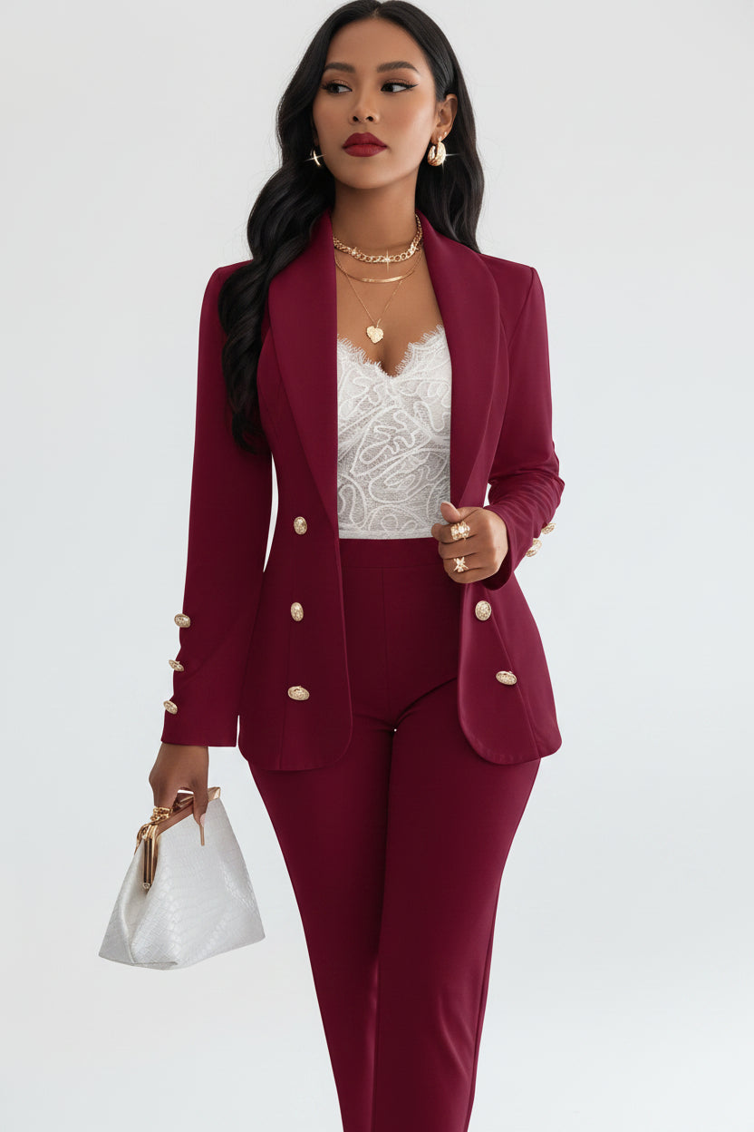 Woman in a red suit standing in a bedroom