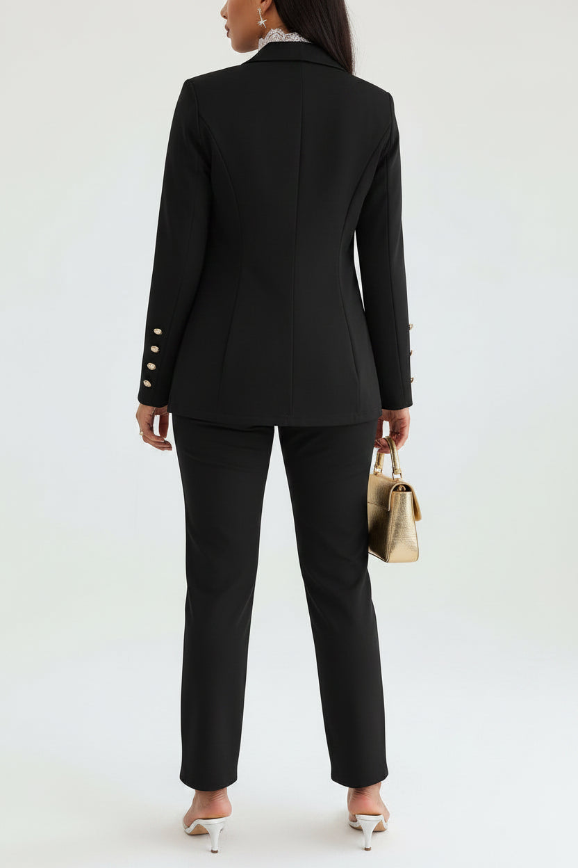 Person wearing a black suit with a white background
