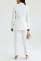 Person wearing a white suit with a white background