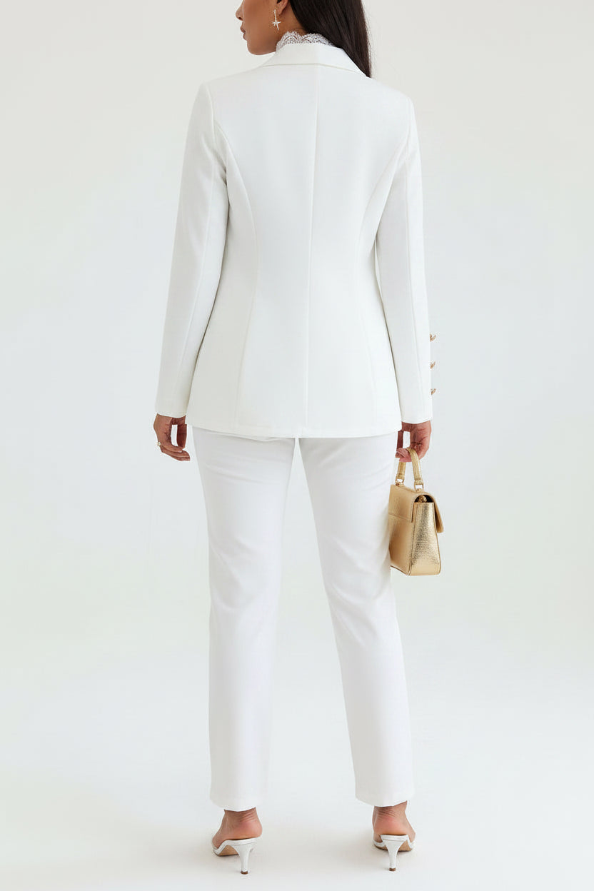 Person wearing a white suit with a white background