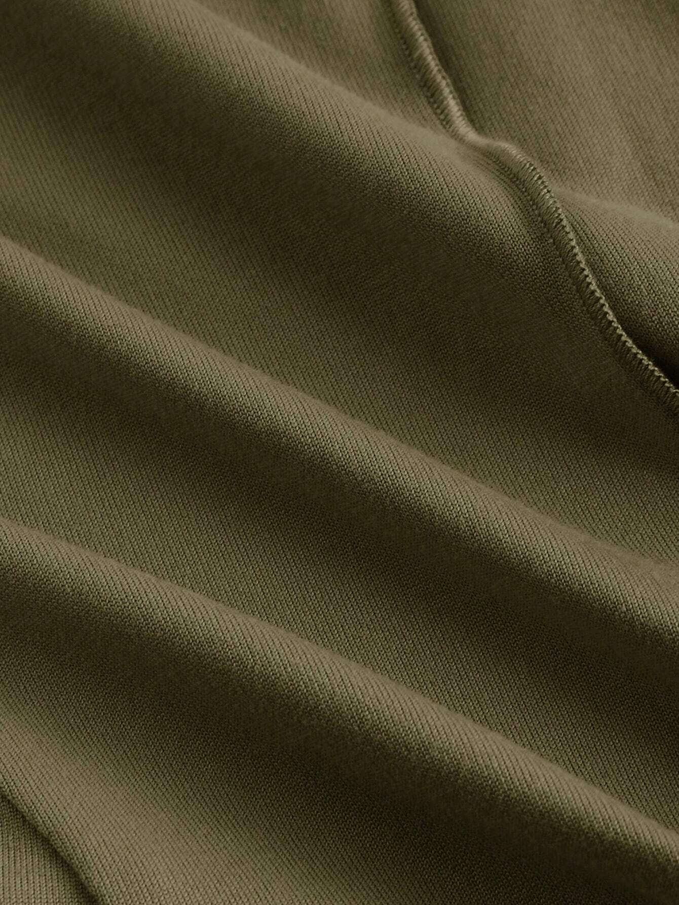 Close-up of olive green fabric texture