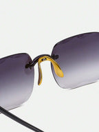 Sunglasses with gradient lenses and gold frame on a white background