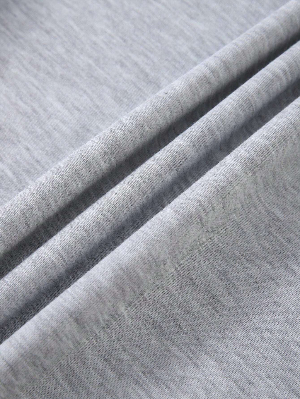 Close-up of gray fabric with a ribbed texture