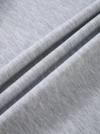 Close-up of gray fabric with a ribbed texture
