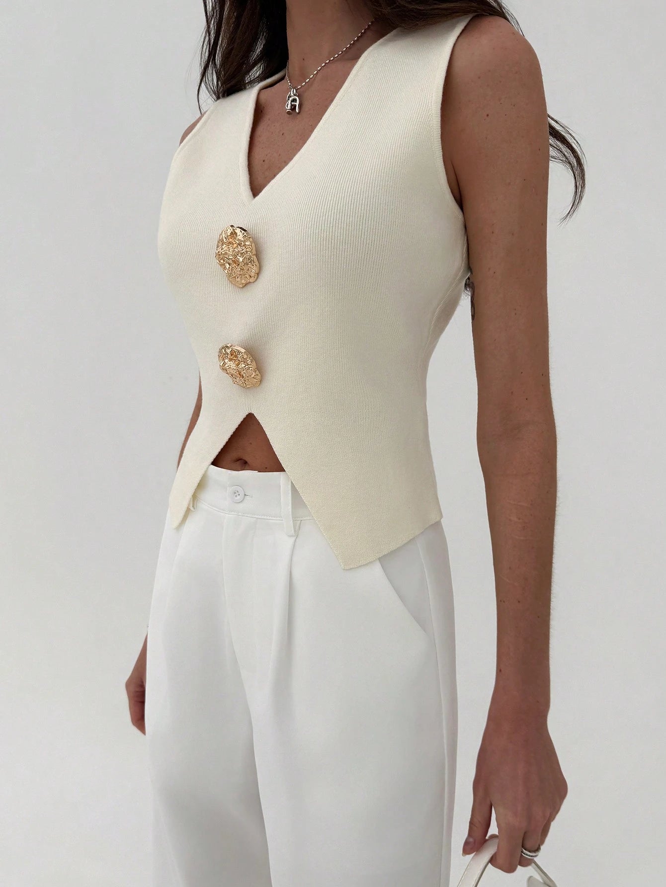 Sleeveless Side Slit Knit Top Hem