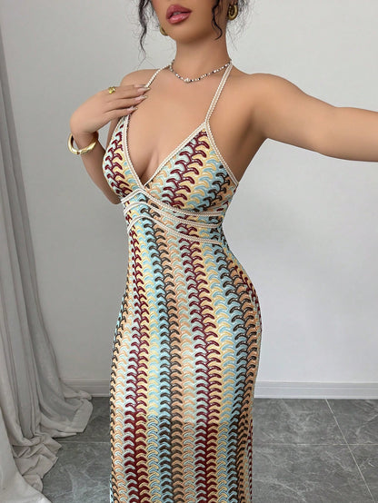 Woman wearing a patterned dress with a plain background