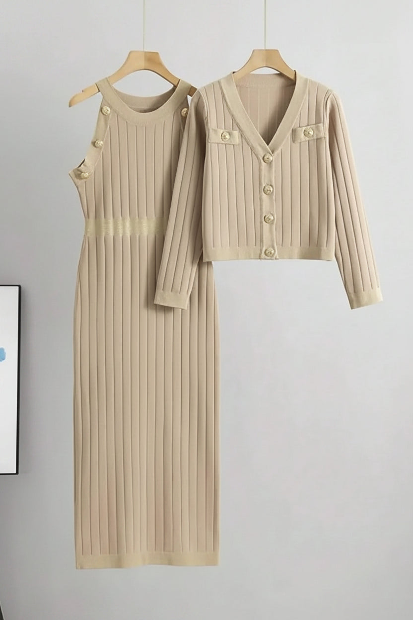 Beige knit dress and cardigan set on hangers against a gray background