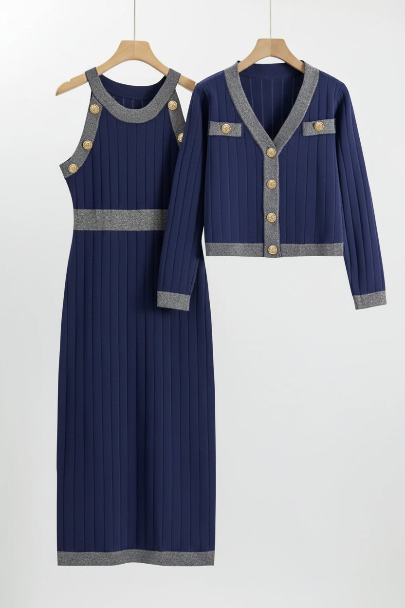 Navy blue dress with gray trim on wooden hangers against a white background