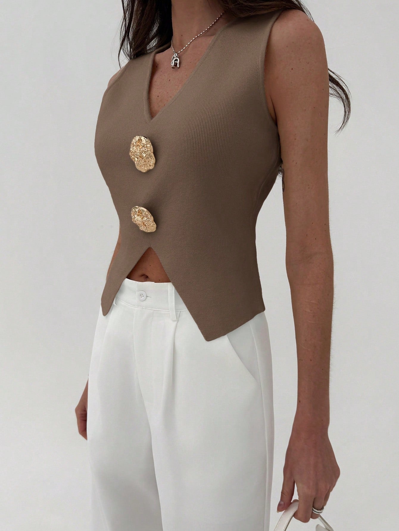 Sleeveless Side Slit Knit Top Hem