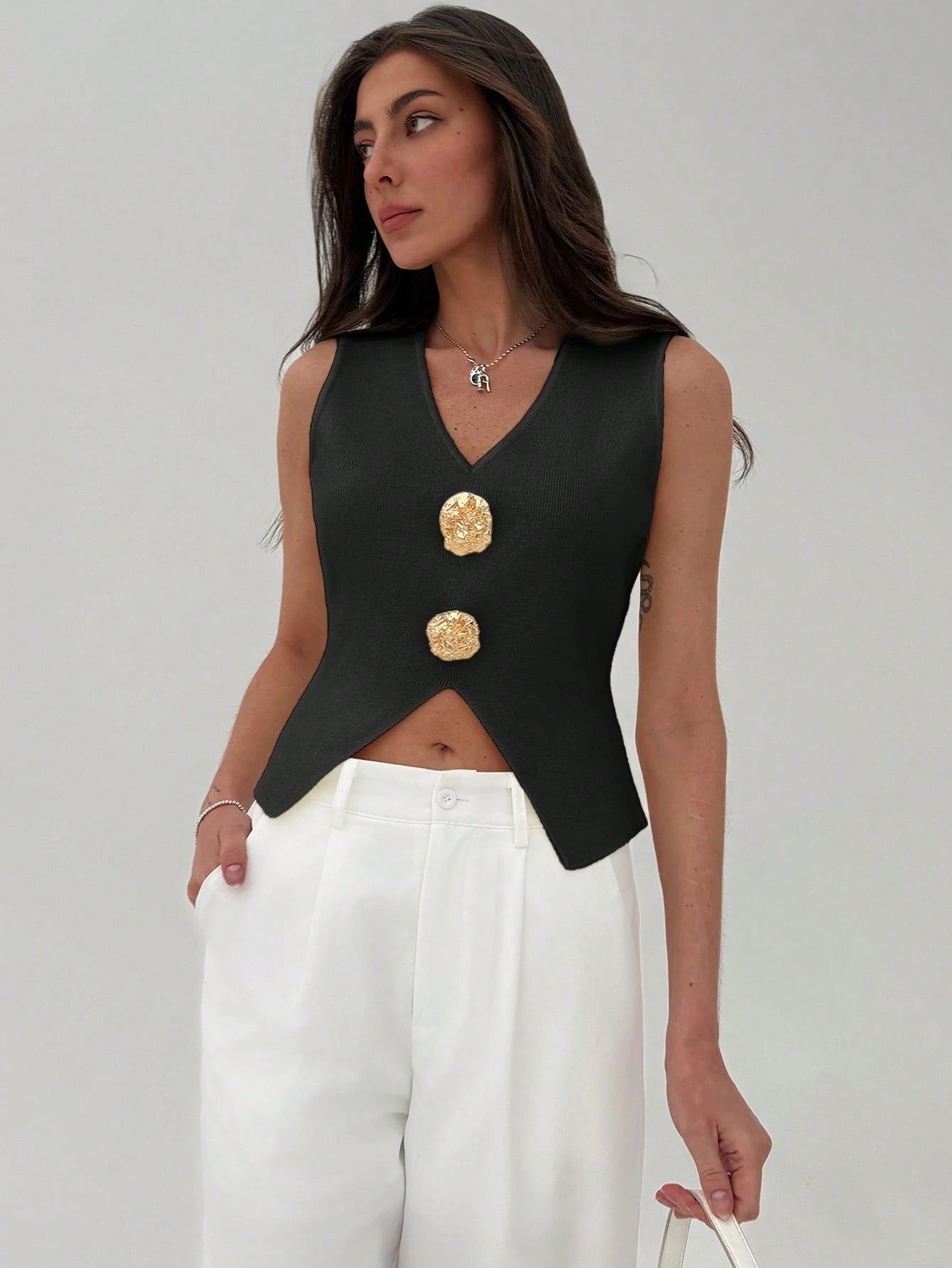 Sleeveless Side Slit Knit Top Hem