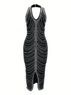 Black dress with silver beading on a white background