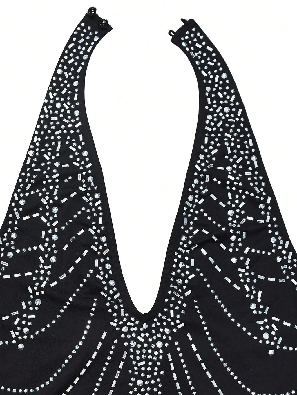 Black top with white rhinestone pattern on a white background