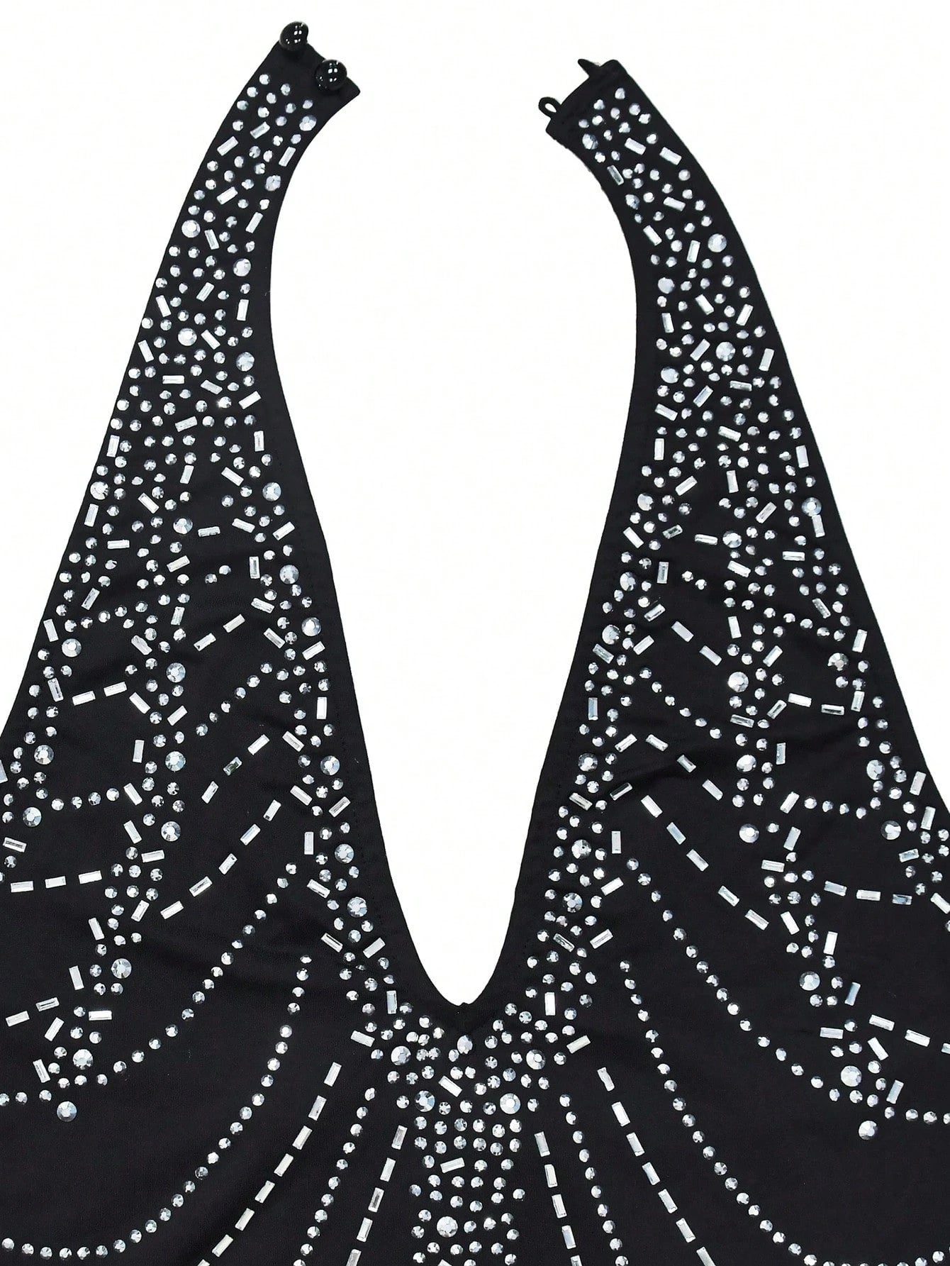 Black top with white rhinestone pattern on a white background