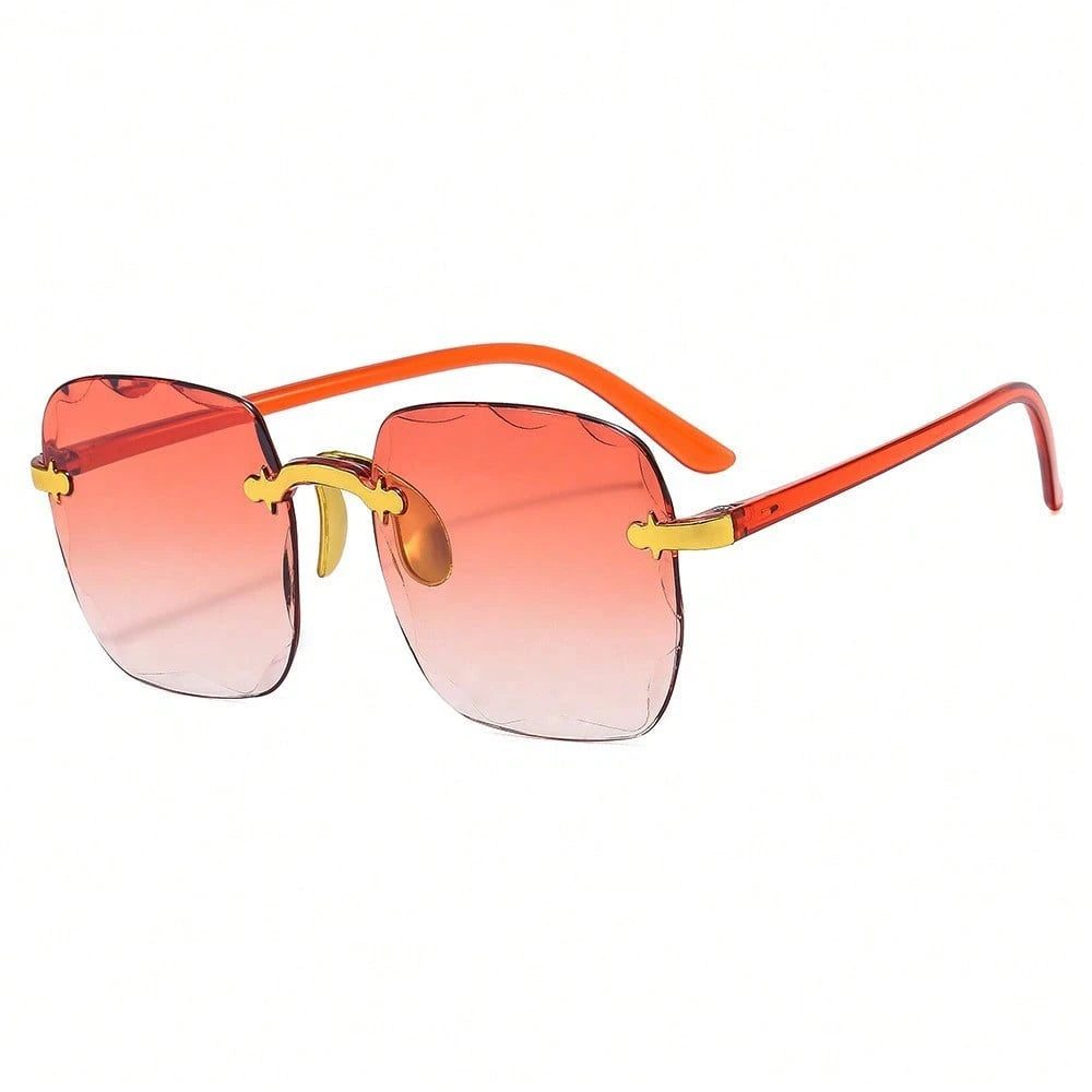 Sunglasses with orange gradient lenses and gold accents on a white background