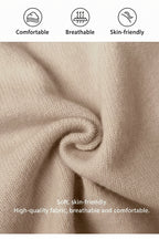 Close-up of beige fabric with icons and text indicating comfort, breathability, and skin-friendliness.