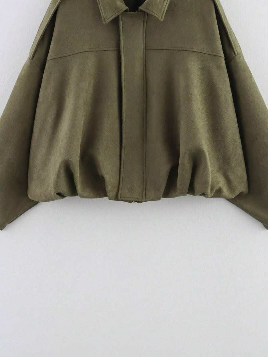 Green coat on a white background