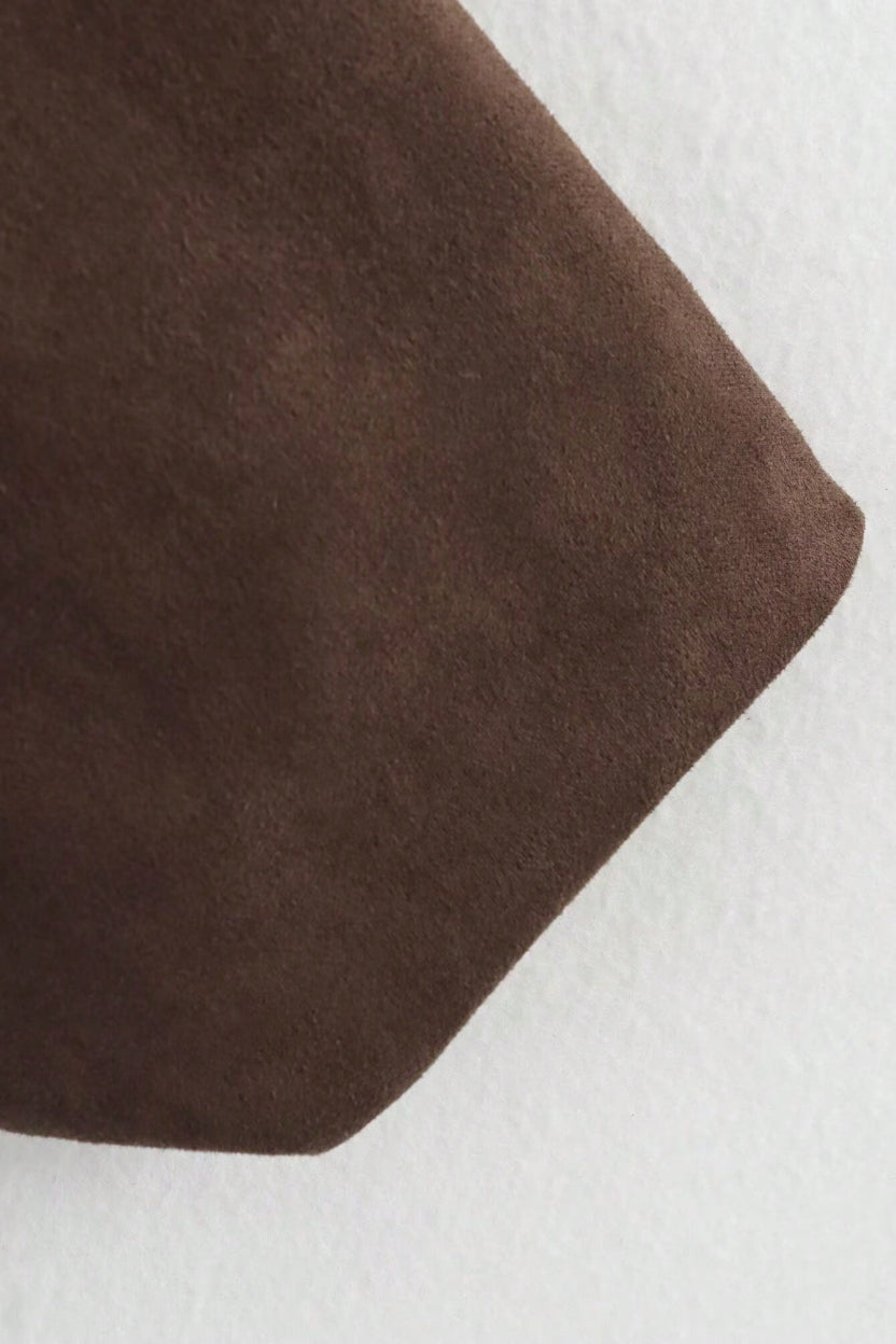 Brown fabric corner on a white background