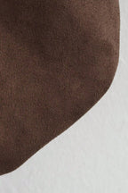 Brown fabric texture on a white background