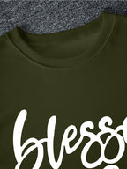 Dark green sweatshirt with 'blessed' printed in white on a textured gray background