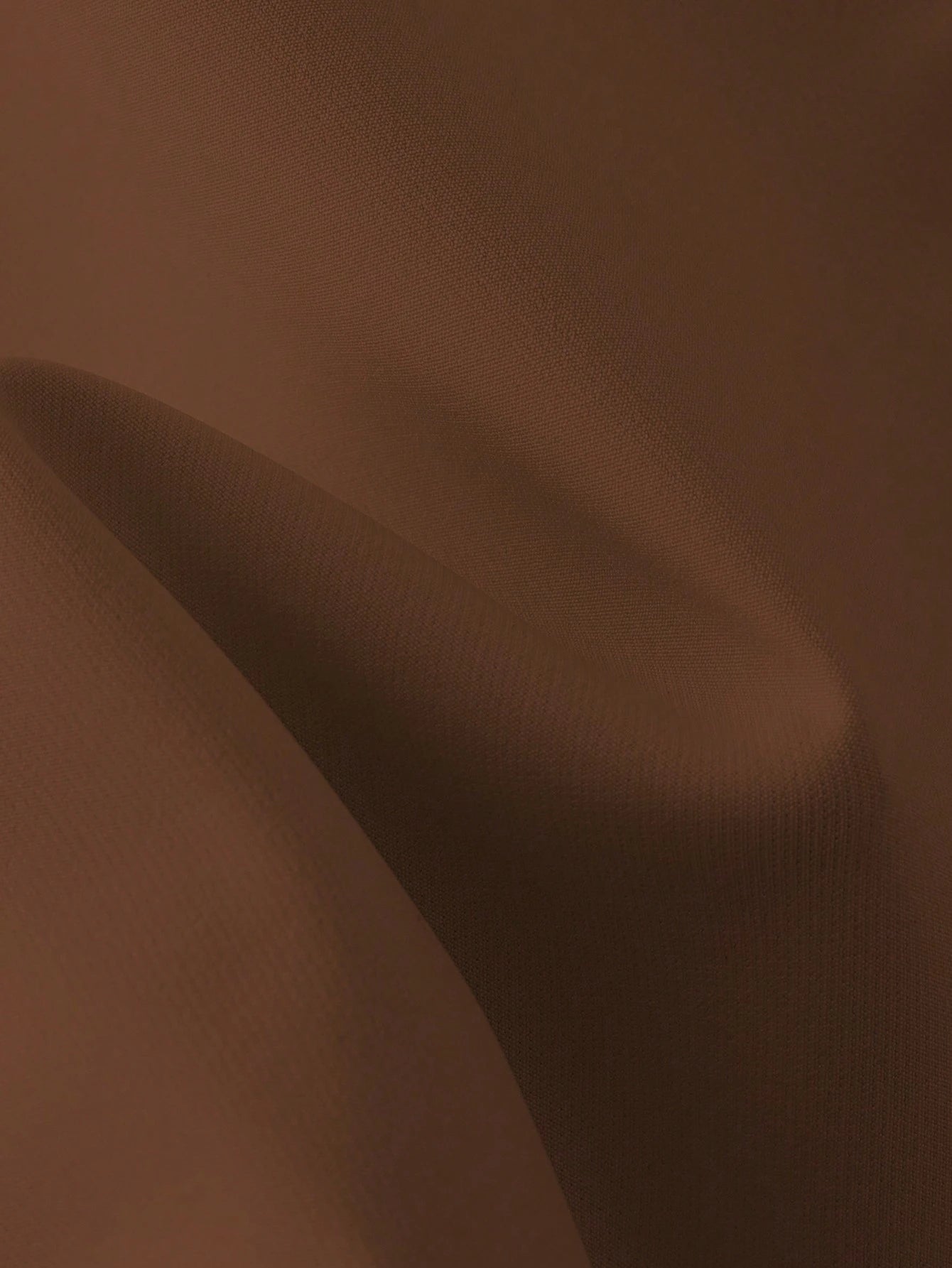 Close-up of brown fabric texture