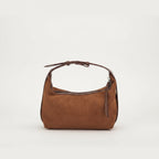 Brown handbag on a light beige background