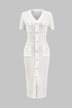 White dress with buttons on a gray background