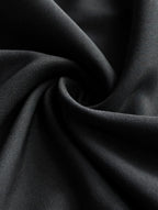 Close-up of black fabric with folds