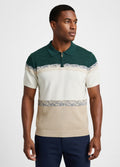 Man wearing a green and beige striped polo shirt on a white background