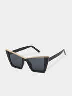 Black sunglasses with gold accents on a white background