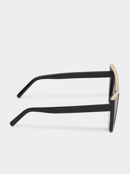 Black sunglasses with gold accents on a white background