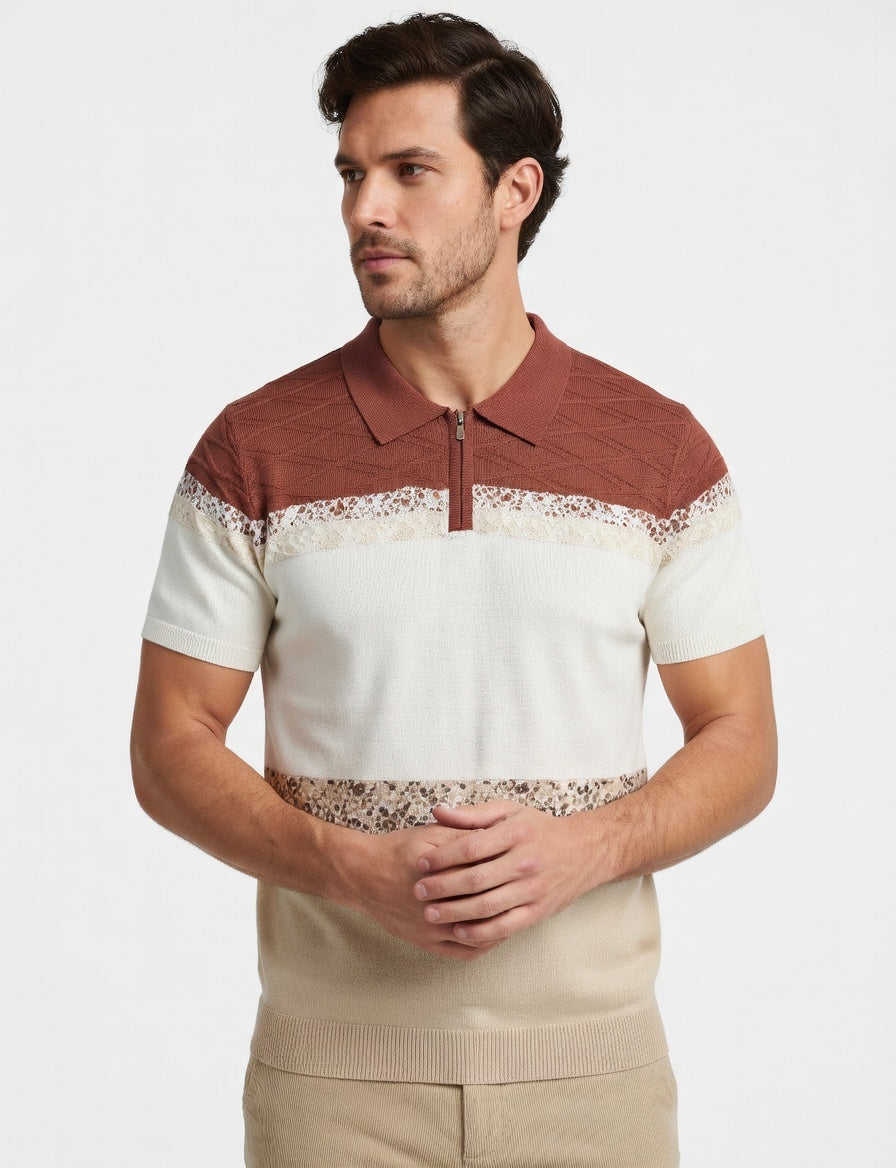 Man wearing a patterned polo shirt with a neutral background