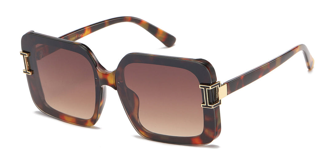 Sunglasses with tortoiseshell frame and brown gradient lenses on a white background