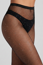 Black fishnet stockings with rhinestone accents on a neutral background