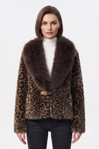 Woman wearing leopard-print faux-fur jacket